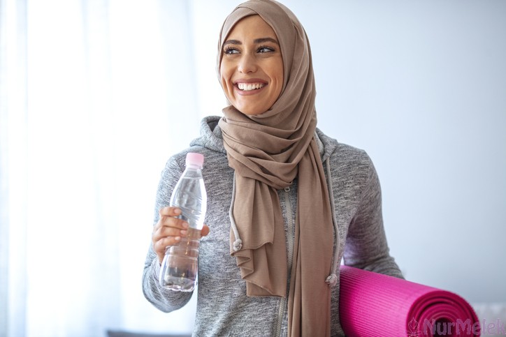 Islamic woman preparing for workout.